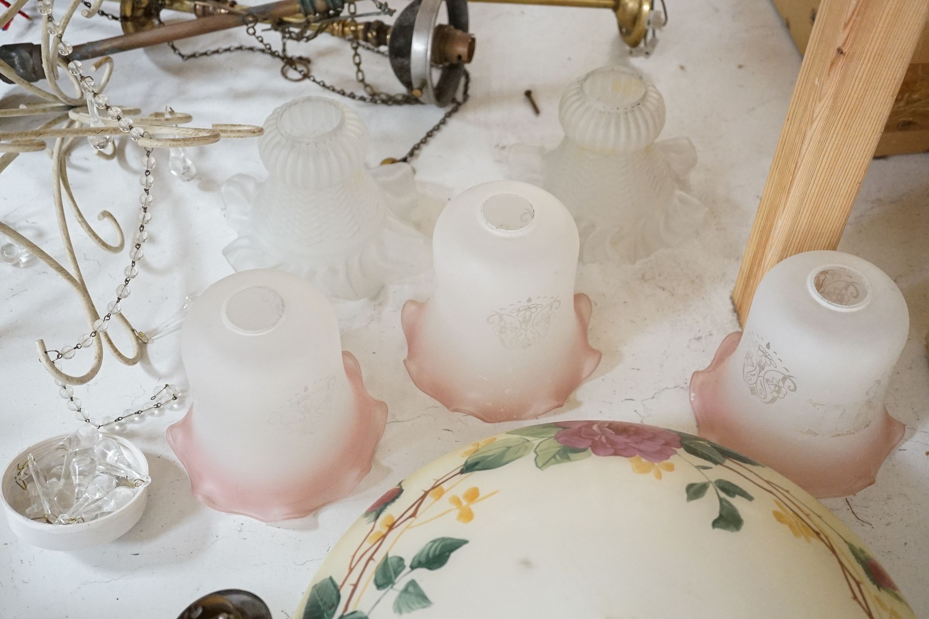 A glass rose decorated plaffonier and various central light fittings